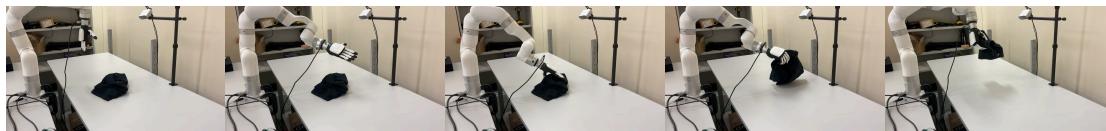 Figure 7: The framework successfully grasping a deformable cloth object in the real world.